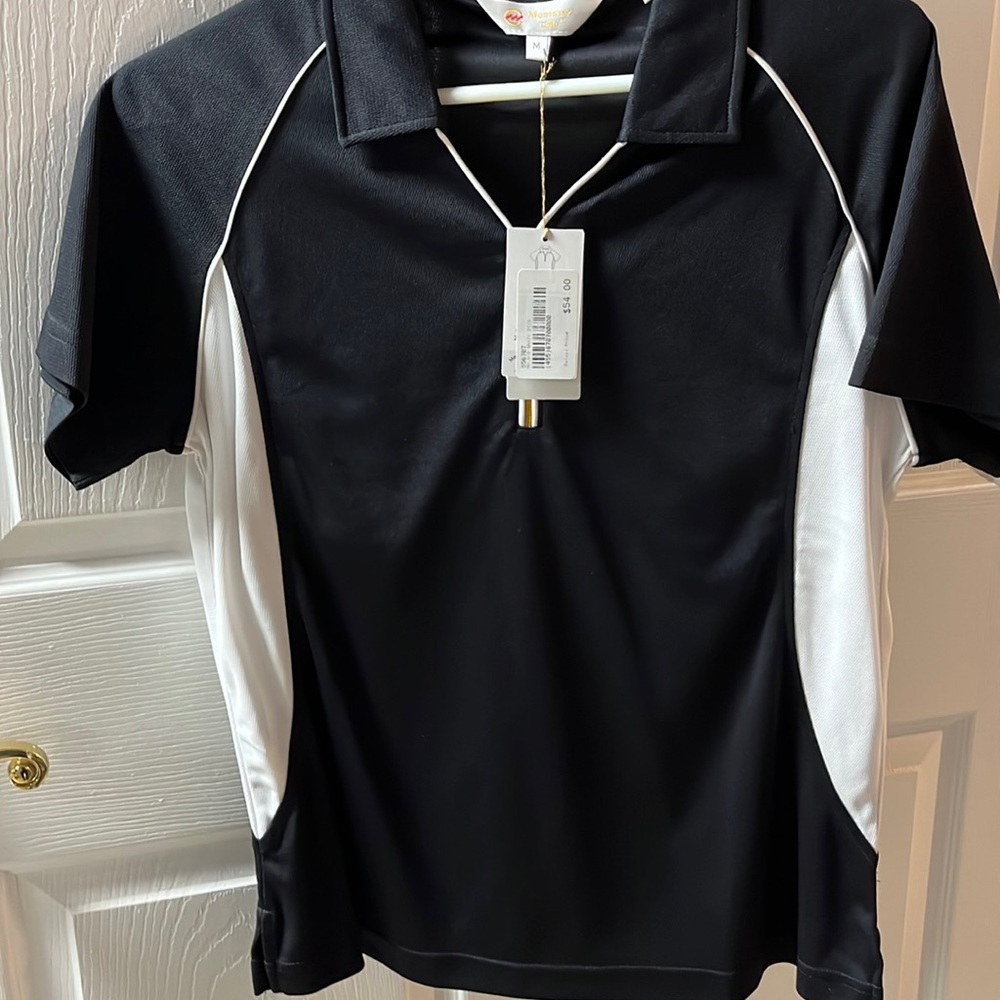 Ladies golf shirt. New w tags size M